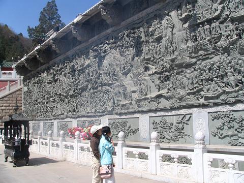 Wall inside the Badachu compund, giant stone carving